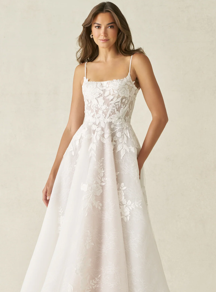 Model wearing a gown by Allure Bridals